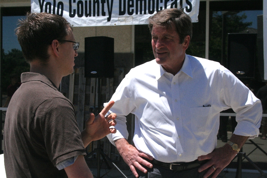 Congressman John Garamendi talks with a campaign intern during the volunteer appreciation BBQ.