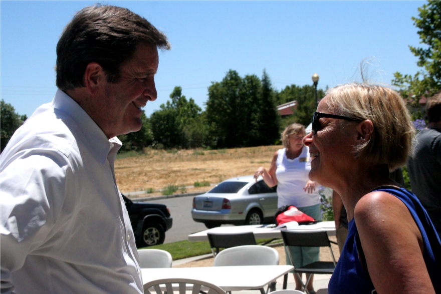 Congressman John Garamendi chats with a volunteer at the volunteer appreciation BBQ.
